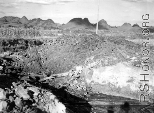 Exploded bridge with explosives at Liuzhou before the Japanese advance during Ichigo in the fall of 1944. 