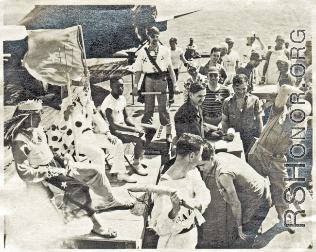 Allegretto, taken aboard MISSION BAY.  He is over toward the left, standing behind the "pirate".  MISSION BAY also carried fifty of the first P-47s to reach the theater.