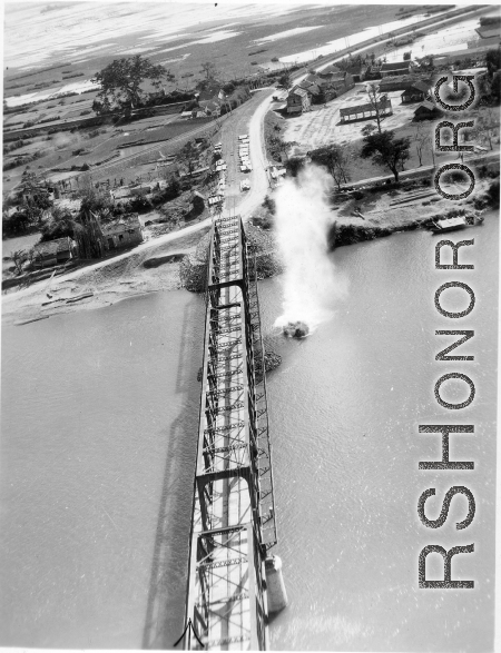 Bombing of Đò Lèn Bridge in Hà Trung Town in French Indochina (Vietnam), during WWII. In northern Vietnam, and along a critical rail route used by the Japanese.