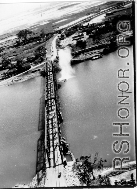 Bombing of Đò Lèn Bridge in Hà Trung Town in French Indochina (Vietnam), during WWII. In northern Vietnam, and along a critical rail route used by the Japanese.