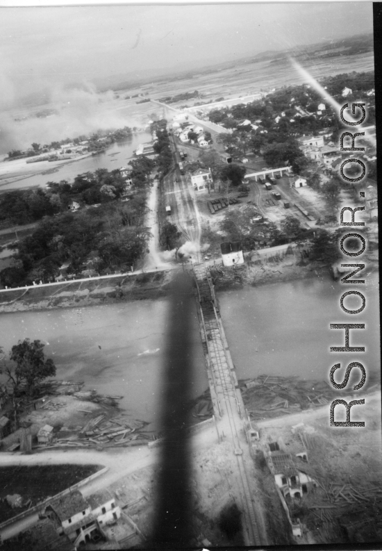 Bombing on Phu Lang Thuong railway bridge over the Thuong River at Bac Giang City in French Indochina (Vietnam), during WWII. In northern Vietnam, and along a critical rail route used by the Japanese.  Coordinates:  21°16'32.69"N 106°11'9.28"E