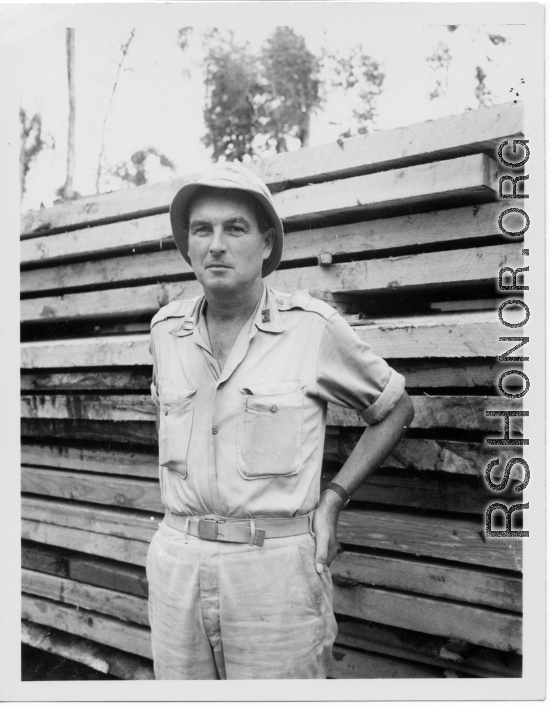 Engineer of the 797th Engineer Forestry Company poses planks in Burma.  During WWII.