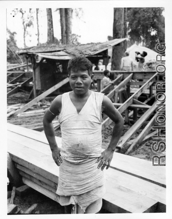 Local people in Burma near the 797th Engineer Forestry Company--A local worker or contract employee at the GI sawmill in Burma.  During WWII.