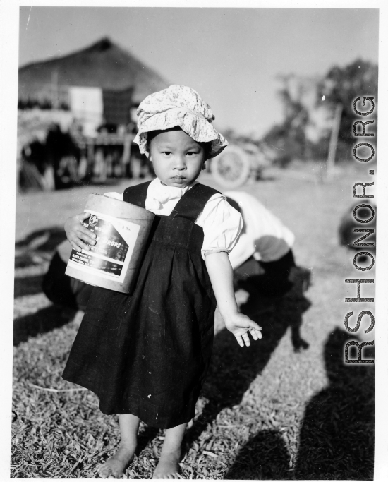 Local people in Burma near the 797th Engineer Forestry Company--a small child.  During WWII.