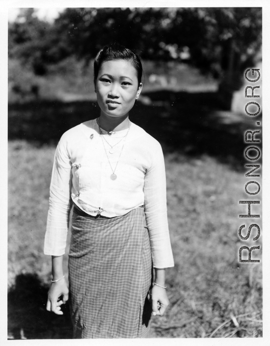 Local people in Burma near the 797th Engineer Forestry Company--a woman.  During WWII.