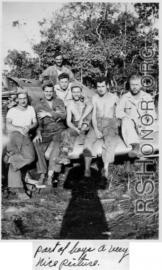 "Part of boys, a very nice picture."  Leo Spearence (with pipe) in center, John Schuhart (far right).  Likely in Burma. 2005th Ordnance Maintenance Company,  28th Air Depot Group.