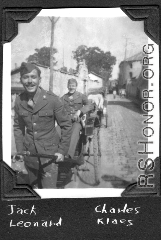 Radar mechanics Jack Leonard and Charles Klaes play with rickshaw in Kunming, Yunnan, China. During WWII.