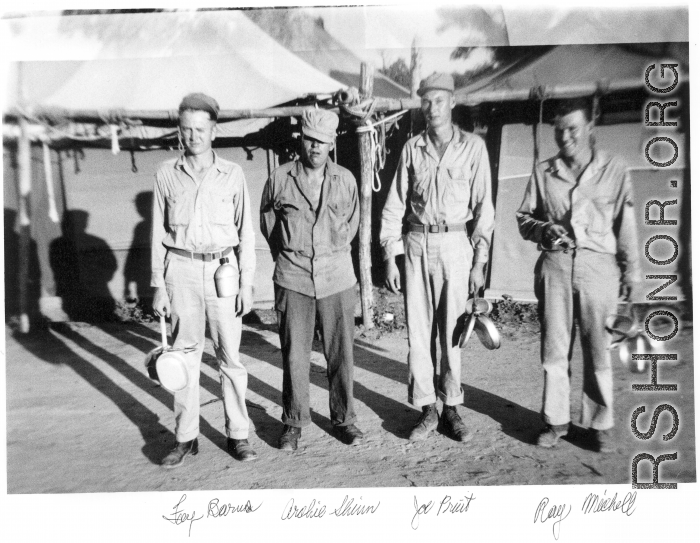 GIs pose with mess gear in front of tents in the CBI during WWII: Joey Barus, Archie Shiun, Joe Pruit, Ray Michell.