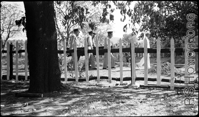 Solemn burial ceremony for American GIS who had died at a temporary war-time graveyard. In the CBI, during WWII.