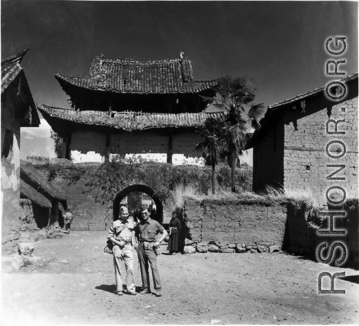 Photographer Eugene Wozniak and a language interpreter take a stroll about in Yunnan, China, during WWII.