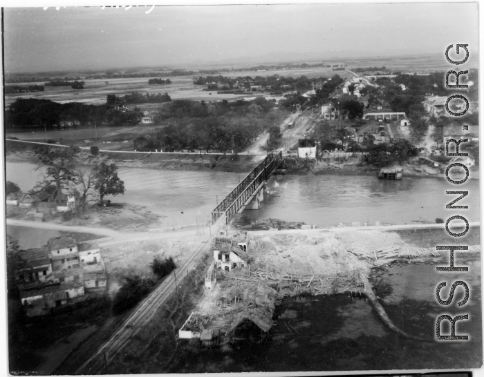 Bombing on Phu Lang Thuong railway bridge over the Thuong River at Bắc Giang City in French Indochina (Vietnam), during WWII. In northern Vietnam, and along a critical rail route used by the Japanese.  Coordinates:  21°16'32.69"N 106°11'9.28"E