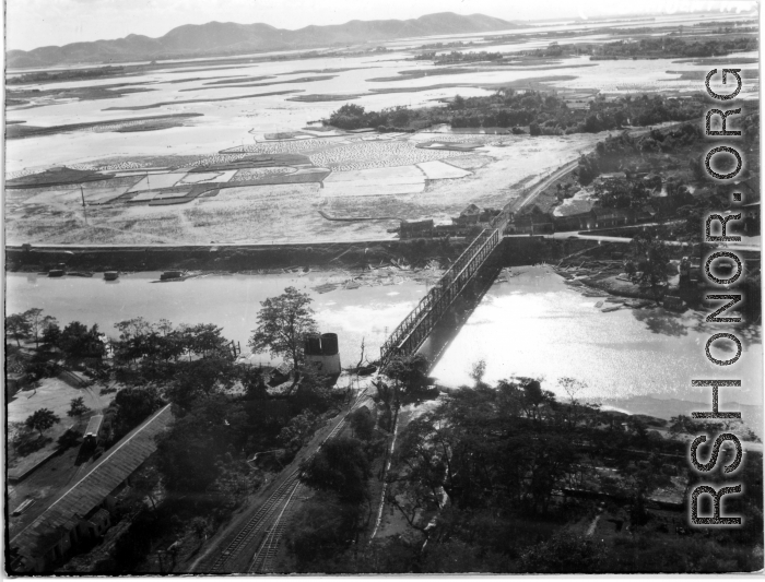 Bombing on Phu Lang Thuong railway bridge over the Thuong River at Bắc Giang City in French Indochina (Vietnam), during WWII. In northern Vietnam, and along a critical rail route used by the Japanese.  Coordinates:  21°16'32.69"N 106°11'9.28"E