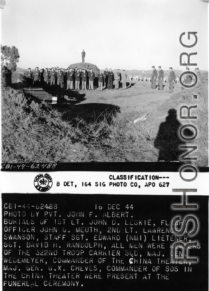 Burials of 1st Lt. John B. Leskie (middle initial corrected), Flight Officer John G. Meuth, 2nd Lt. Lawrence A. Swanson, S/Sgt. Edward Lietener, Sgt. David H. Randolph. All men were members of the 322nd Troop Carrier Squadron. Maj. Gen. Wedemeyer and Maj. Gen. G. X. Cheves were present at the funeral ceremony.  December 16, 1944.  Photo by Pvt. John F. Albert. B-Detachment, 164th Signal Photographic Company, APO 627.