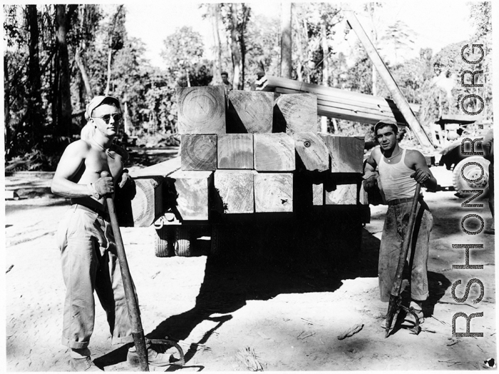 797th Engineer Forestry Company mill in Burma, cutting beams and delivering them for bridge building along the Burma Road.  During WWII.