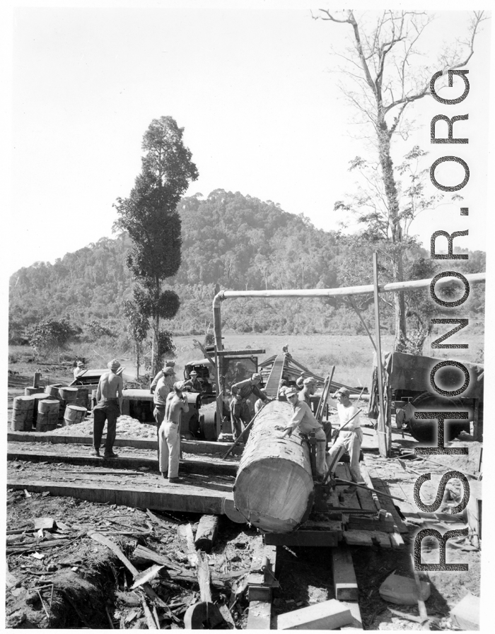 797th Engineer Forestry Company mill in Burma, cutting beams for bridge building along the Burma Road.  During WWII.