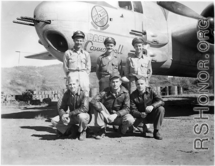 American aircrew men with the B-25H "Wabash Cannonball", of the 491st Bomb Squadron, at Yangkai Airbase, Yunnan Province, China, in the CBI.  In unknown order, back row; 1Lt. Robert P. Ridley (pilot), Captain William F. Shutts (pilot), 1Lt. Sterling L Plunkett (nav-bomb); Front row (left to -right) S/Sgt Charles M. Sugg (engineer-gunner), T/Sgt John P. Humphries (radio-gunner), S/Sgt Walter U. Stachler (armorer-gunner).