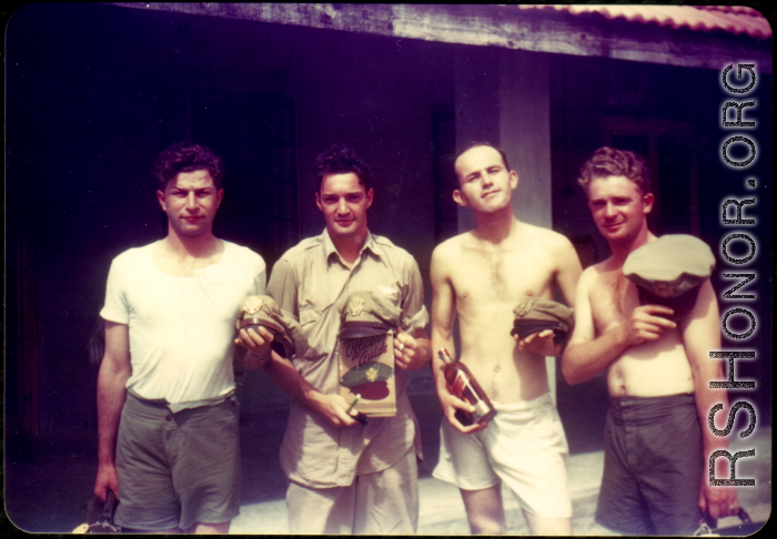 American flyers goof in front of barracks in China.