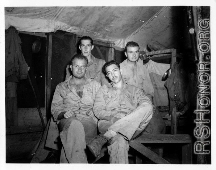 Engineers of the 797th Engineer Forestry Company pose in their barracks in Burma.  During WWII.