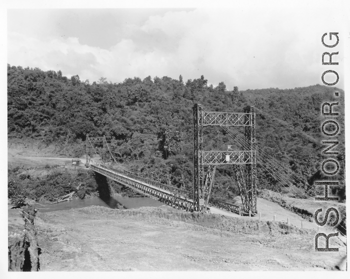 797th Engineer Forestry Company in Burma: Suspension bridge over a river on the Burma Road.  During WWII.