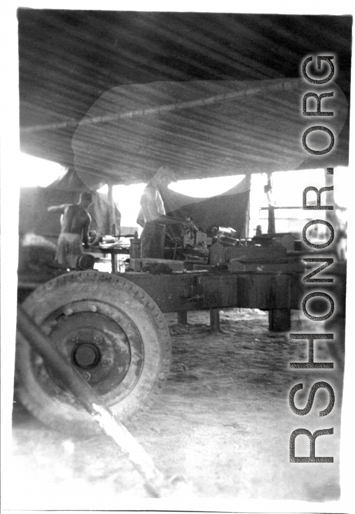 Men of the 2005th Ordnance Maintenance Company,  28th Air Depot Group, working on an anti-aircraft gun in Burma. During WWII.