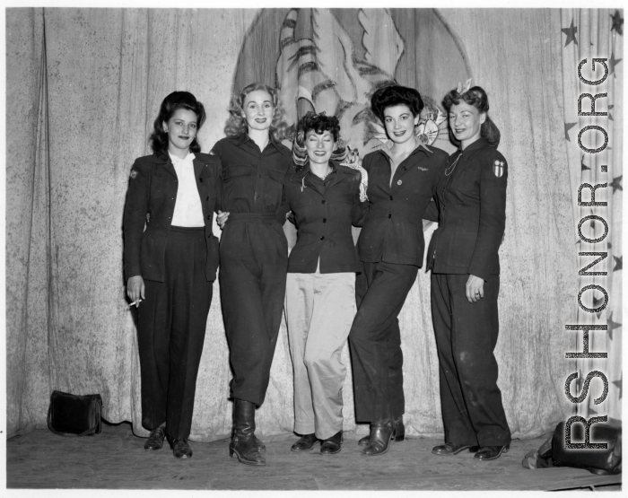 Celebrities visit and perform at Yangkai, Yunnan province, during WWII: Various starlets pose of the stage at Last Resort.