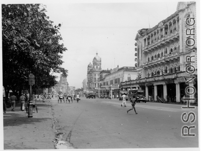 Street in large Indian city.  Scenes in India witnessed by American GIs during WWII. For many Americans of that era, with their limited experience traveling, the everyday sights and sounds overseas were new, intriguing, and photo worthy.