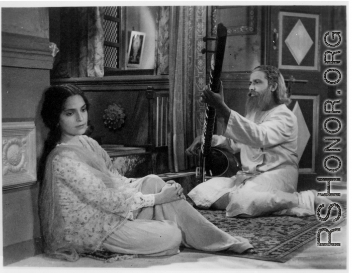 Purchased image with scene from an Indian movie.  Scenes in India witnessed by American GIs during WWII. For many Americans of that era, with their limited experience traveling, the everyday sights and sounds overseas were new, intriguing, and photo worthy.