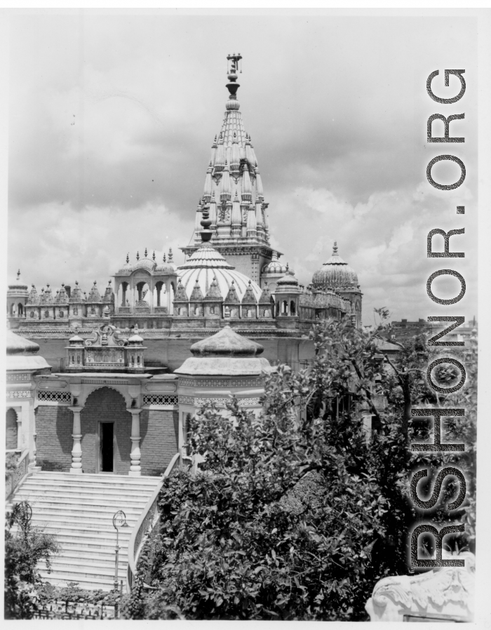 An elaborate temple.  Scenes in India witnessed by American GIs during WWII. For many Americans of that era, with their limited experience traveling, the everyday sights and sounds overseas were new, intriguing, and photo worthy.