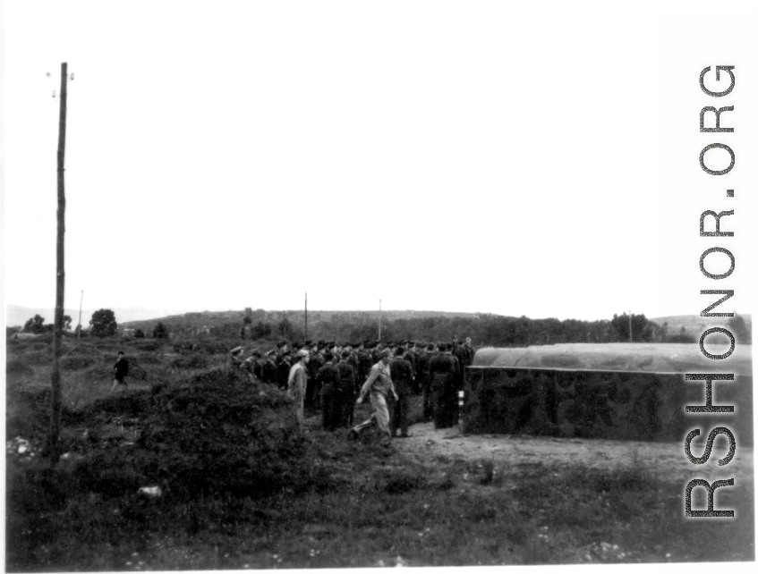 Burial ceremony at the temporary American military graveyard outside of Kunming, Yunnan, China. 