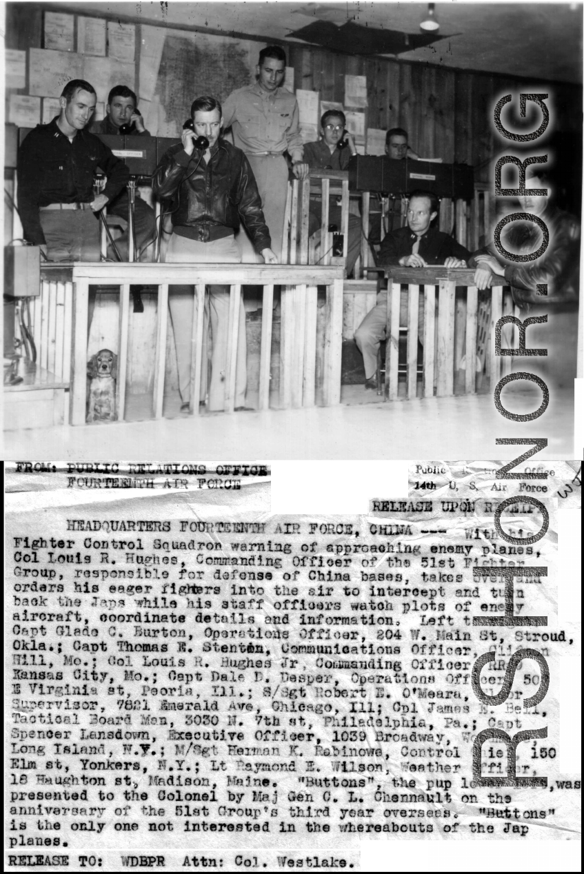 Scene of the workings of the Fighter Control Squadron, 51st Fighter Group, 14th Air Force, as the team works to plot and intercept Japanese planes. Left to right: Capt. Glade C. Burton, Capt. Thomas E. Stenton, Col. Louis R. Hughes, Jr., Capt. Dale D. Desper, S/Sgt. Robert E. O'Meara, Cpl. James E. Bell, Capt. Spencer Lansdown, M/Sgt. Herman K. Rabinowe, Lt. Raymond E. Wilson, and "Buttons" the puppy.