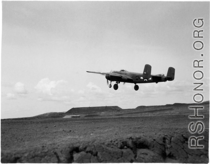 A B-25 takes off in the CBI, most likely from a base in Yunnan or Guangxi.