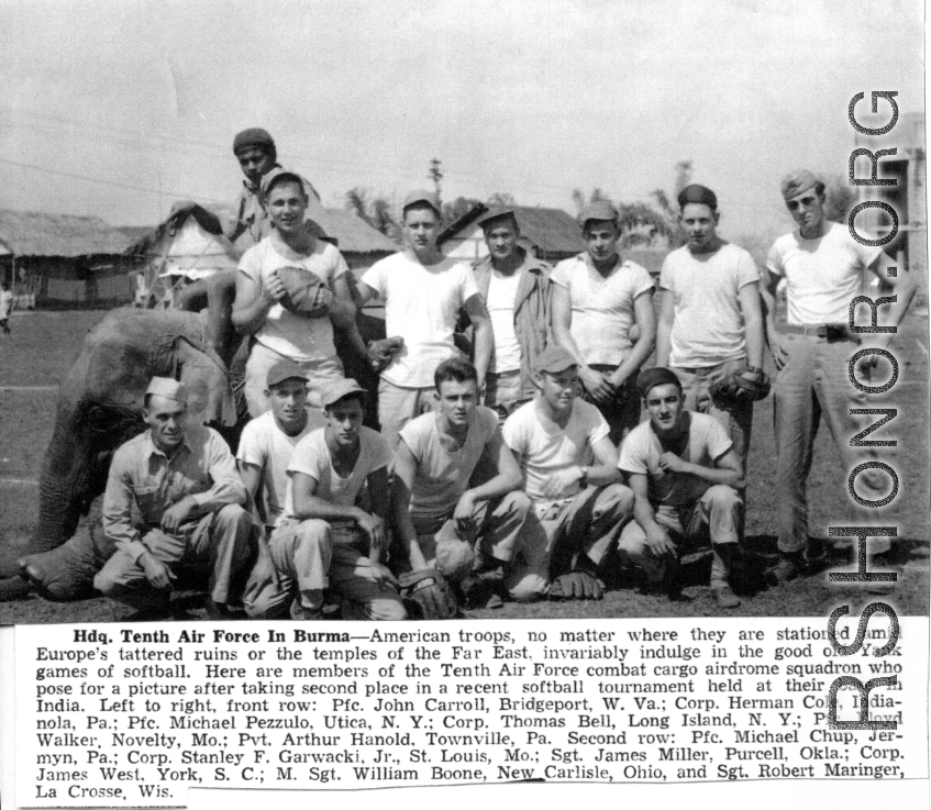 10th Air Force combat cargo airdrome squadron softball team pose: Pfc. John Carroll, Corp. Herman Cole, Pfc. Michael Pezzulo, Thomas Bell, Pfc. Floyd Walker, Pvt. Arthur Hanold, Pfc. Michael Chup, Corp. Stanley F. Garwacki, Jr., Sgt. James Miller, Corp. James West, M/Sgt. William Boone, and Sgt. Robert Maringer.