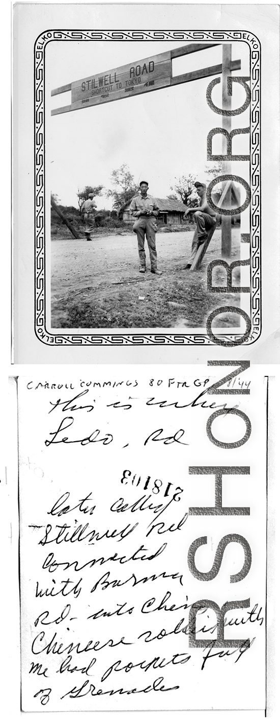 GI Carroll Cummings, 80th Fighter Group, pauses for a moment with a Chinese soldier (pockets full of grenades) on the Stilwell Road/Ledo Road, during WWII.