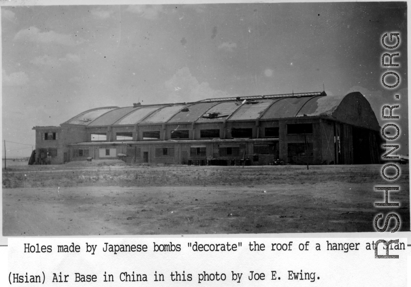 A hanger with holes from Japanese bombs in Xi'an (Hsian) Air Base during WWII.   Photo from Joe E. Ewing.