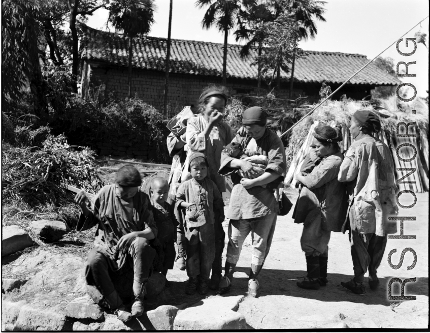 Woman in a village near Yangkai, China, during WWII.  From the collection of Eugene T. Wozniak.