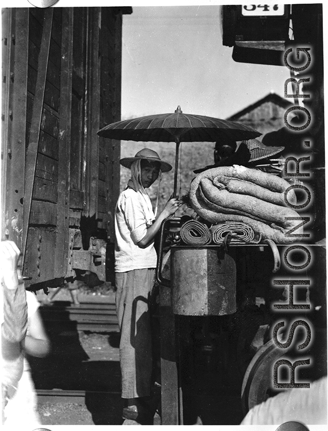 Chinese civilian evacuation via train in Guangxi province, China, during WWII, during the summer or fall of 1944 as the Japanese swept through as part of the large Ichigo push.