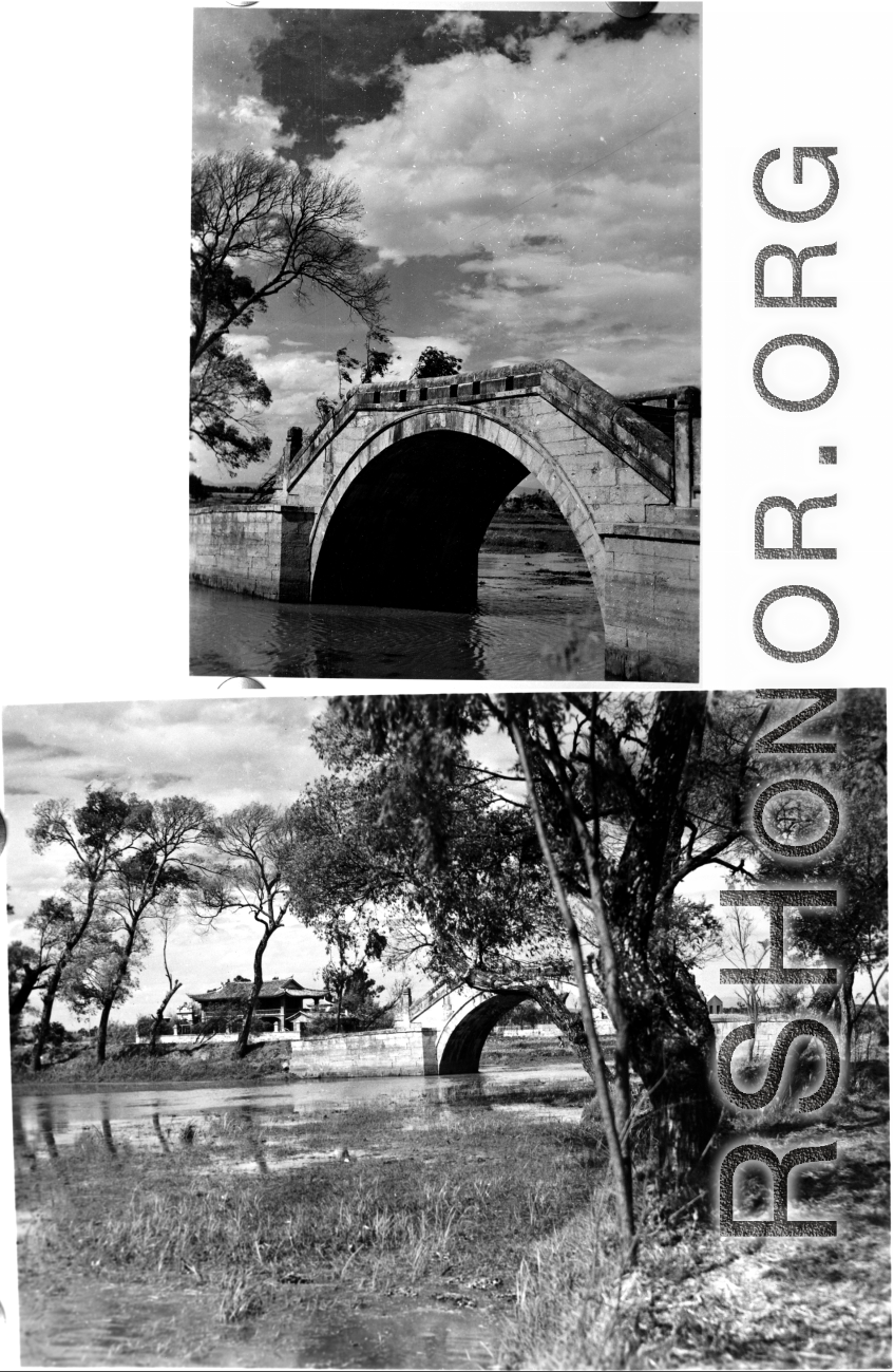 A arched stone bridge in Yunnan, China, during WWII.