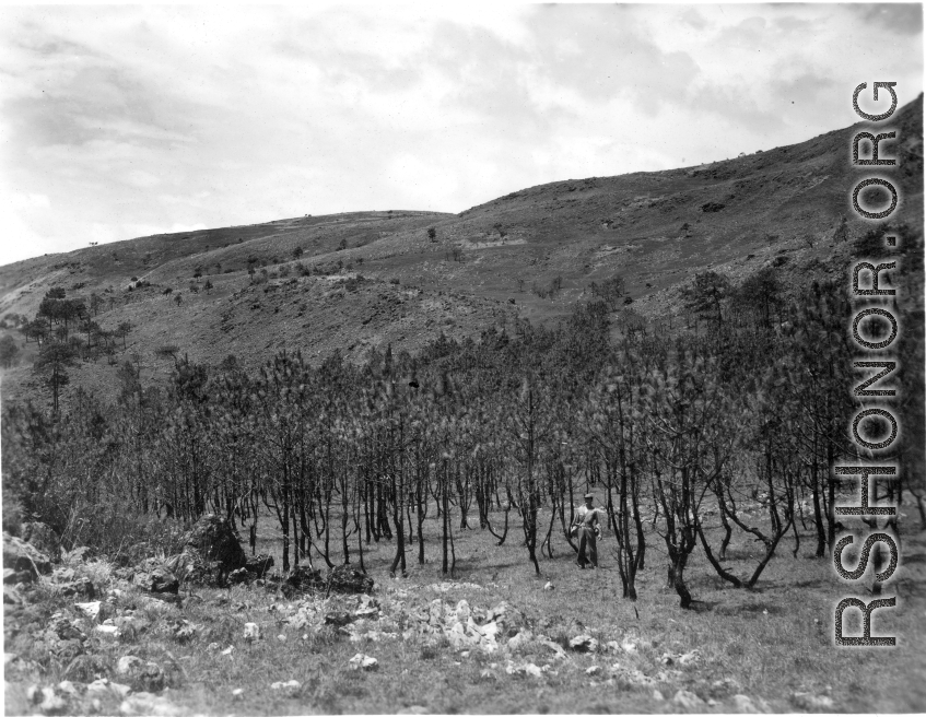 An American serviceman walking in the countryside in Yunnan province, China, during WWII.