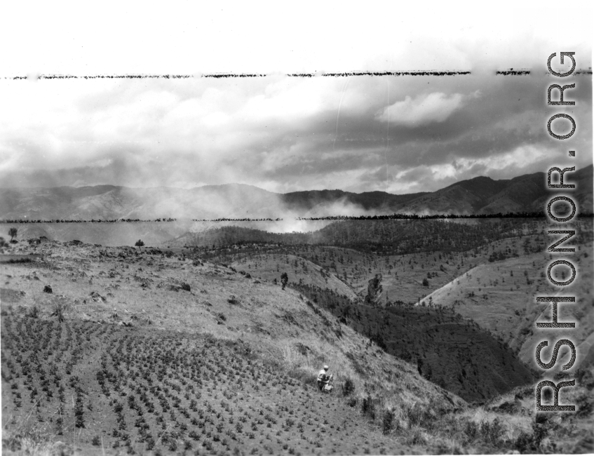 A GI walks in the countryside in Yunnan province, China. During WWII.