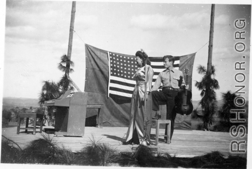 Pat O'Brien's USO troupe performs at an American airbase in China in October 1944--Here  Jimmy Dodd and Ruth Carrol perform.