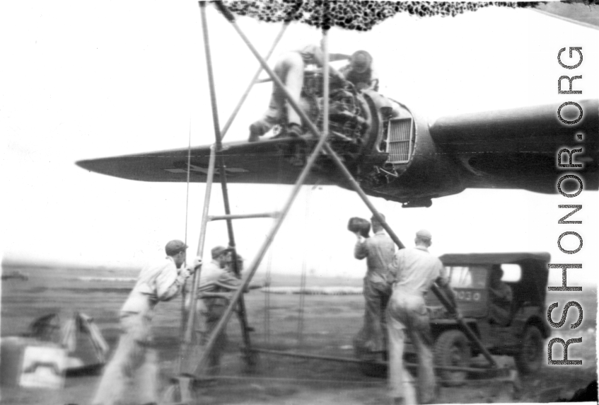 "This Is A Group Of 396th Mechanics Changing A B-24 Engine At Luichow (Liuzhou), China."