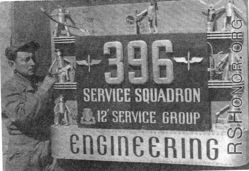 “Yang Tong Air Base, Kwelin (Guilin),China,1944. This is the 396th Air Service Squadron logo with Joe Goodman the guy that designed and built it. This was just one of many items that Joe designed and built."