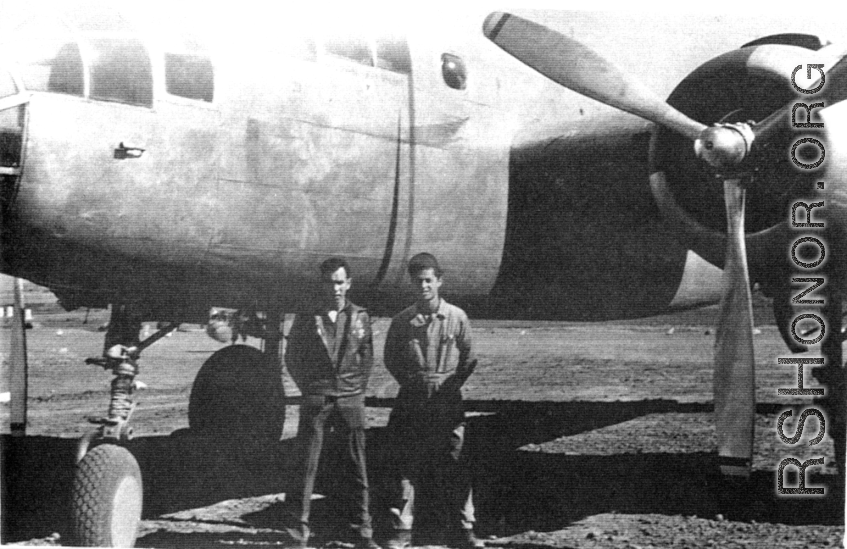 "This is a picture of General 'Casey' Vincent's plane The Silver Slipper. The 396th prepared this plane for the General at Kwelin, China. Sgt. Joe Cooper of the 396th was crew chief of the plane. The two guys in the picture are Taylor on the left and Cooper on the right. Taylor was the radio operator on the plane."