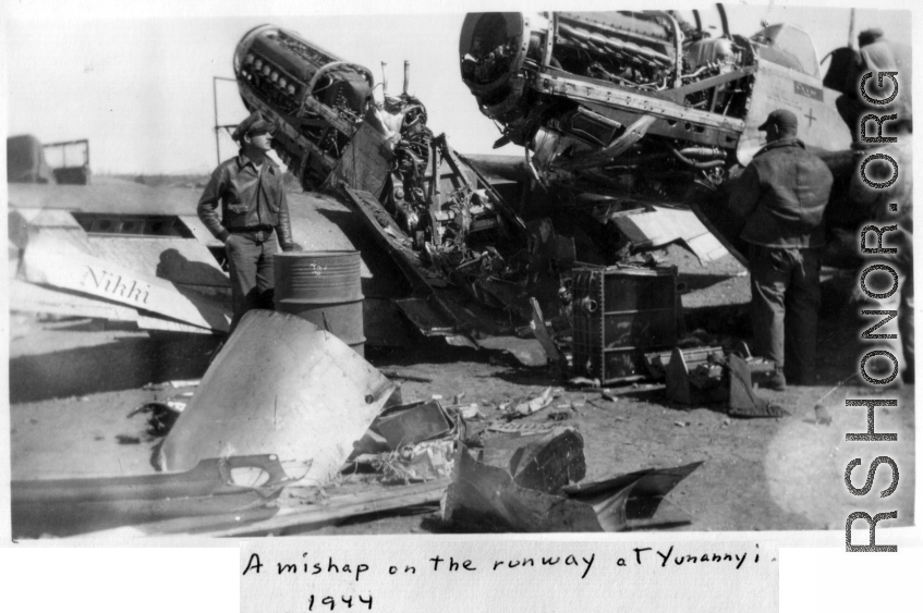 Two American fighter planes, apparently P-51s, collided on a runway at Yunnanyi, China, during WWII, in 1944.