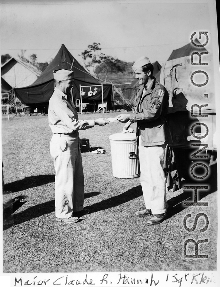 Major Claude R. Hannah and 1st/Sgt. Klein interact at a camp in India during WWII.   From the collection of David Firman, 61st Air Service Group.