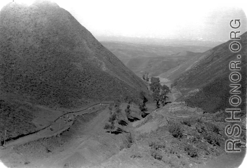 Mountains in northern China, with road, during WWII.