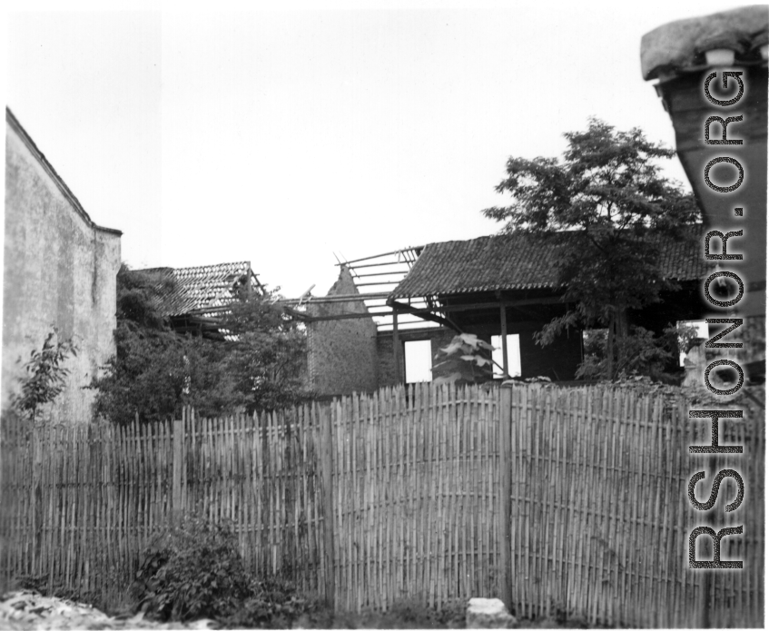 A damaged building in China, presumably bomb damage. During WWII.