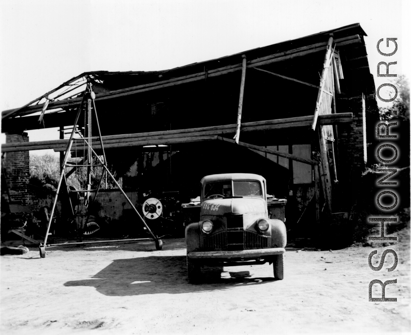 A building for repairing aircraft in China during WWII.