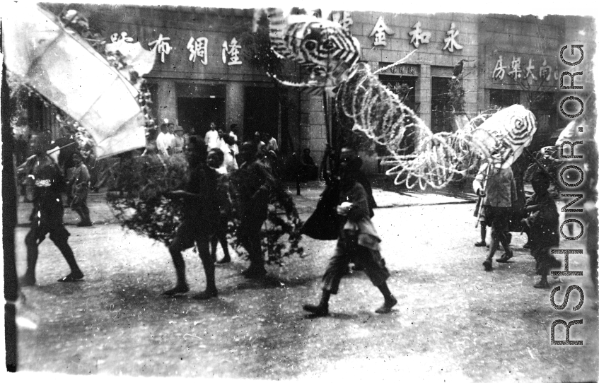 A local parade in China in the CBI during WWII.