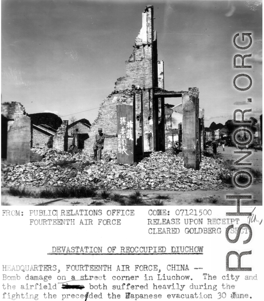 GI poses among the rubble. Bomb damage on a street corner in Liuchow (Liuzhou). The city and airfield both suffered heavily during the fighting that preceded the Japanese evacuation on June 30, 1945. A American serviceman stands in the foreground, next to a slogan that reads in Chinese, "Support Chairman Jiang", and the name of the building formerly, the "Lucky Cafe" shows on a concrete post on the right. 